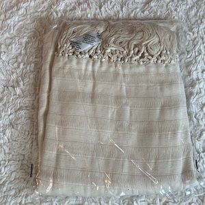 Never open tan scarf or tapestry.